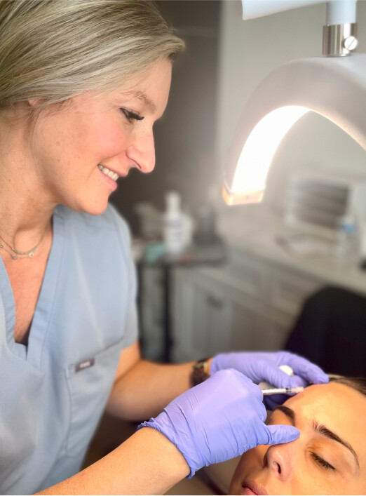 a woman getting a permanent makeup.